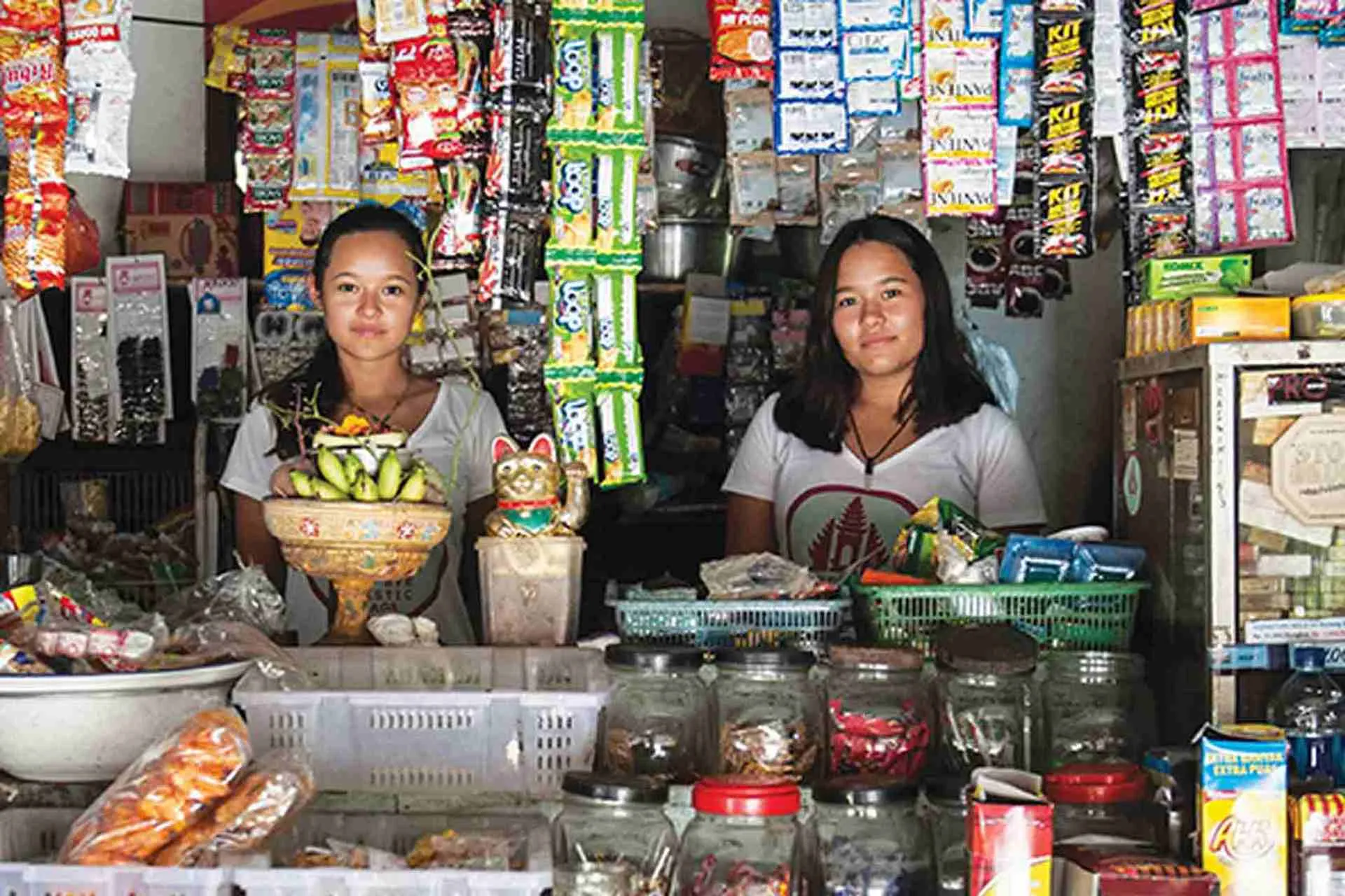 Melati and Isabel in a typical Bali small shop