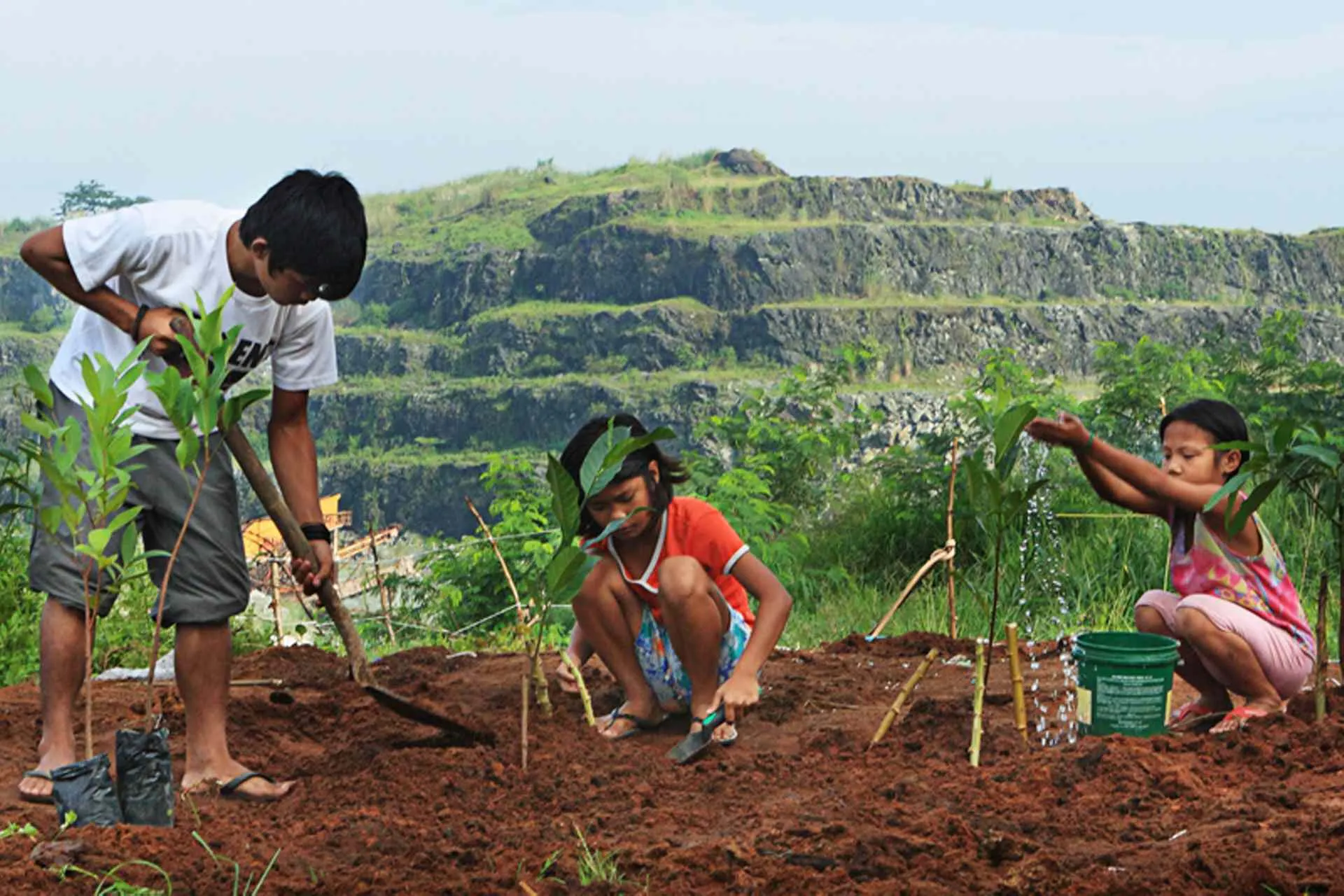 Children plant trees in mining site, Karlo Emmanuel Victoriano